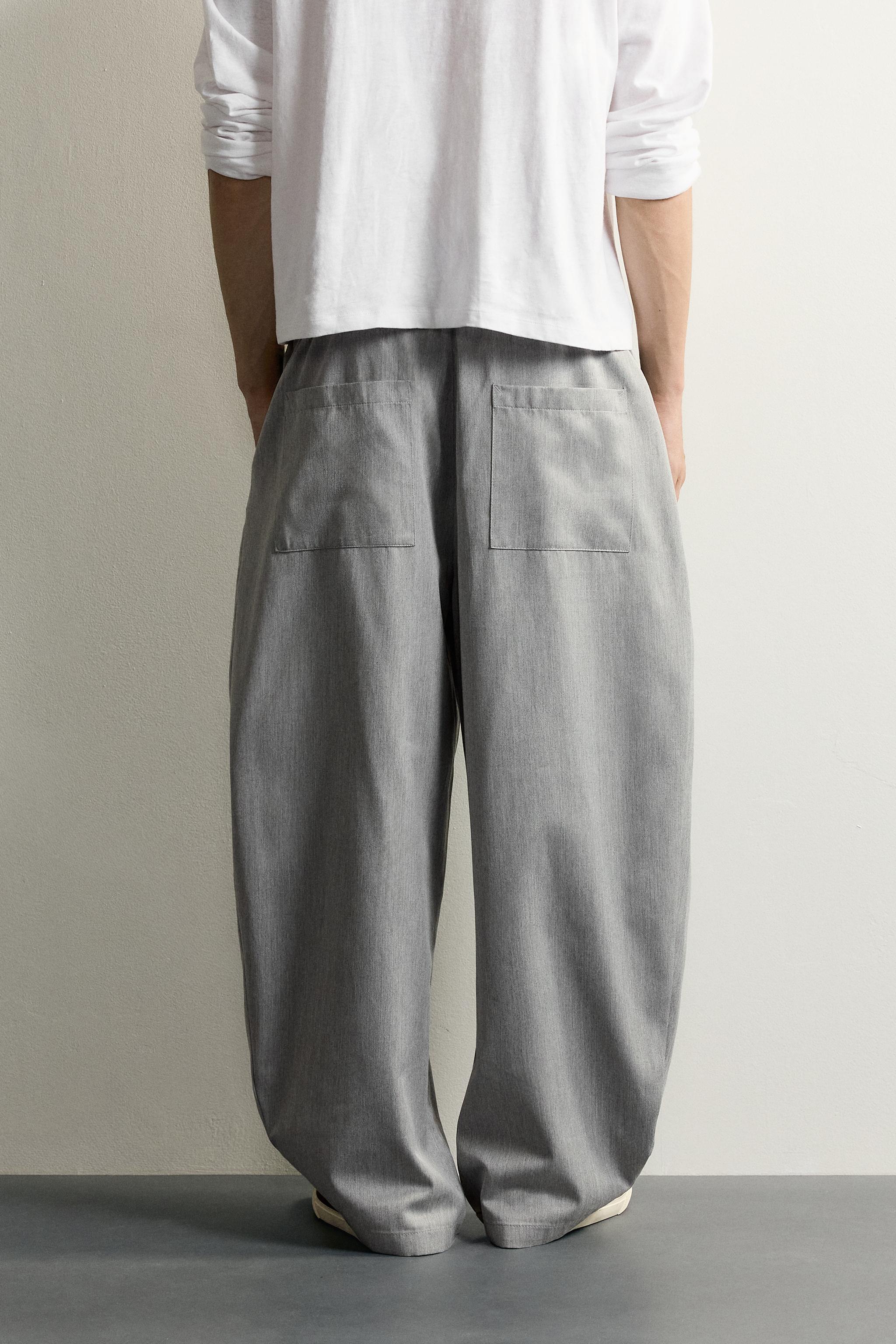 PANTALON BALLOON FIT À PLIS LATÉRAUX